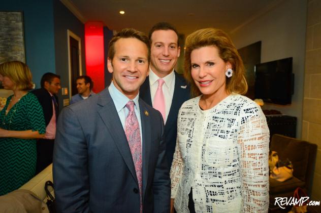 Congressman Aaron Schock and Ambassador Nancy G. Brinker flank  Eric Brinker.